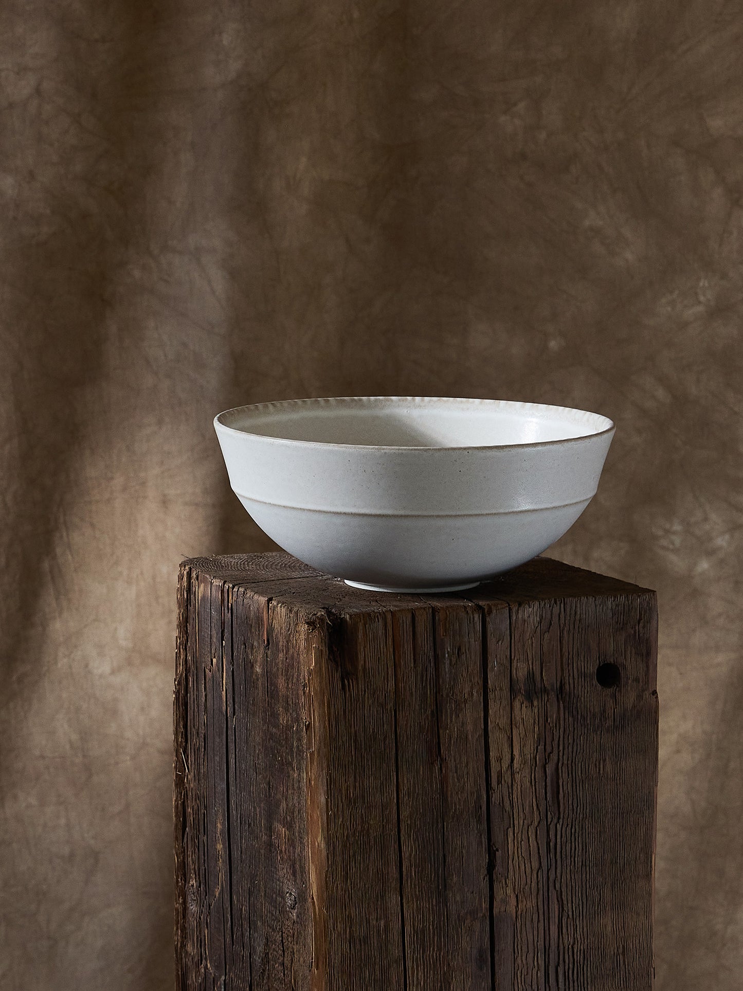 High end ceramic serving bowl with a modern, timeless shape