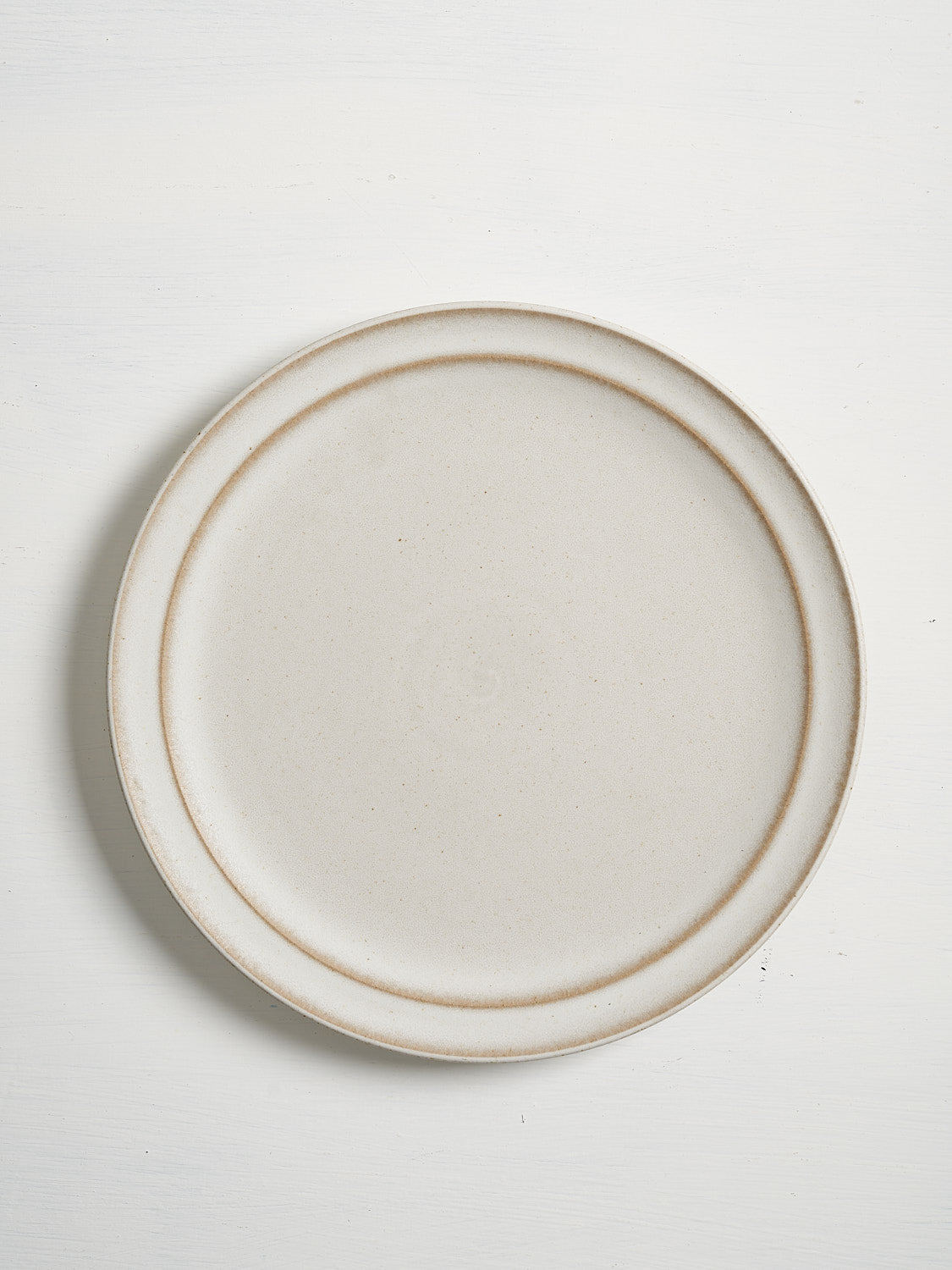 Ceramic off white dinner plate for everyday and elevated dining