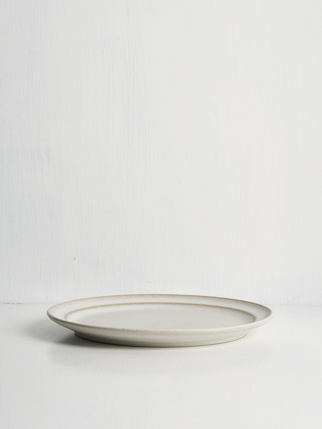 Designer ceramic lunch or salad plate with cream semi-matte finish