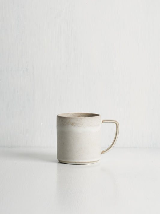 High end white stoneware mug made in Portugal with relaxed, timeless design