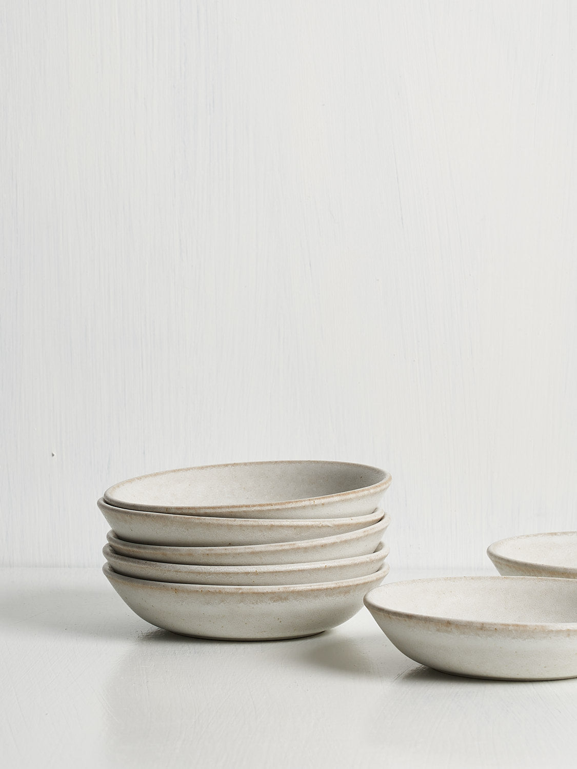 Soulfully simple stoneware olive bowls crafted in Portugal